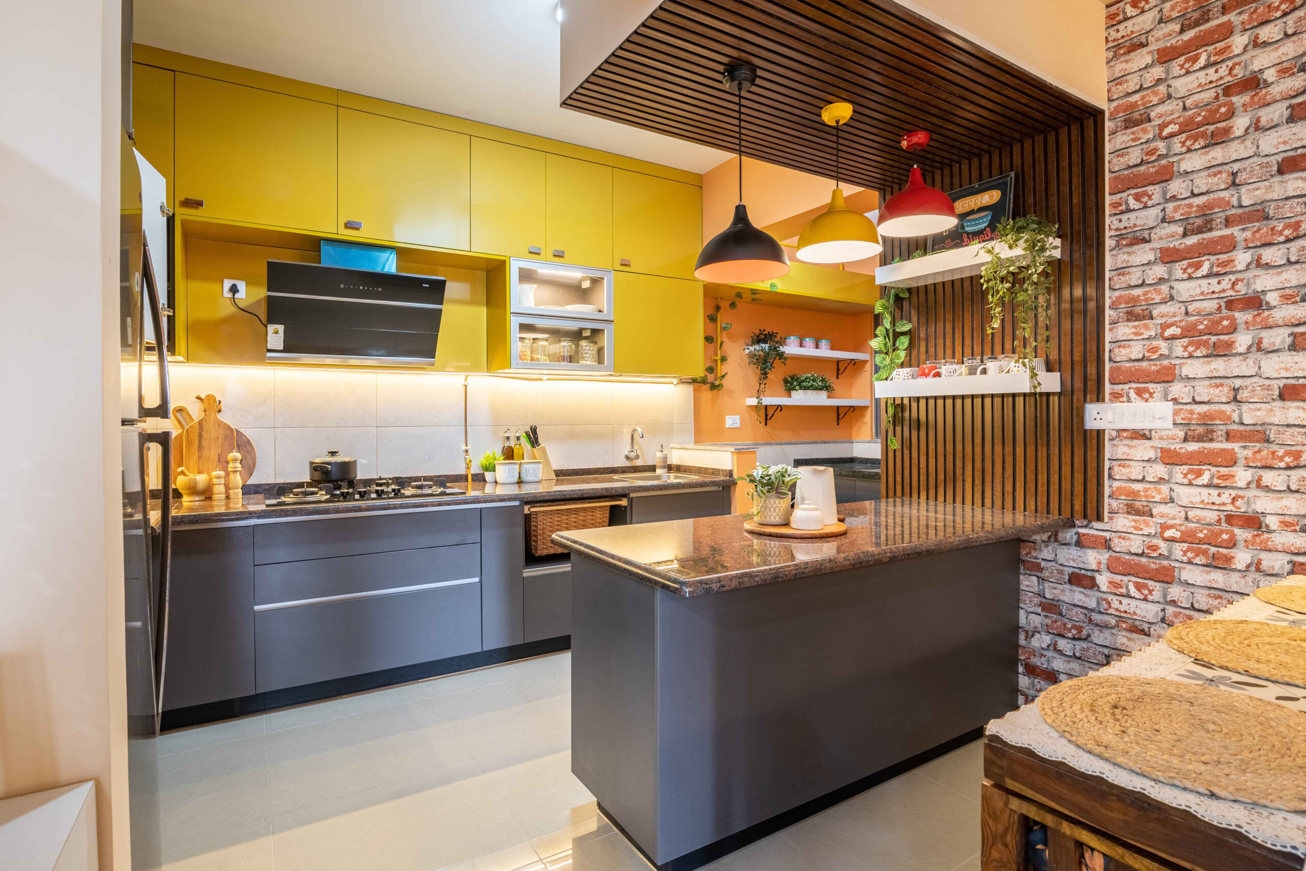 Modern Open Kitchen Design With River Stone And Marrigold Yellow Cabinets - 12X9 Ft | Livspace within Kitchen Ideas Dark Cabinets