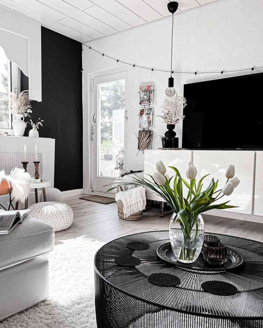 From Stark to Sophisticated How to Style White and Black Living Rooms
