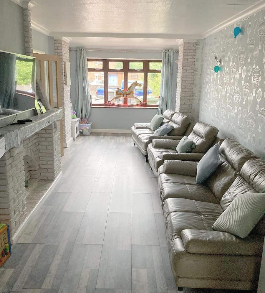 Creative Design Ideas For Enhancing A Long Living Room Space in Lighting tricks for making narrow living spaces feel larger